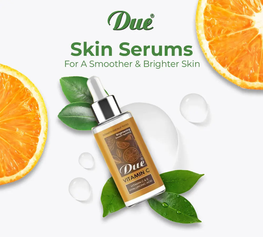 Skincare serum bottle with oranges and leaves on a white background, featuring the brand 'Due'.